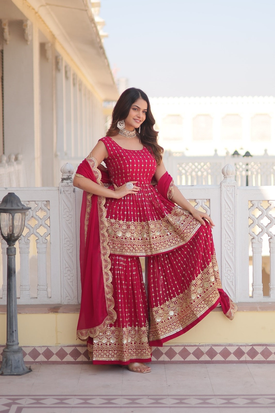 Unique Faux Georgette Purple & Pink Color Top With Sharara Suit