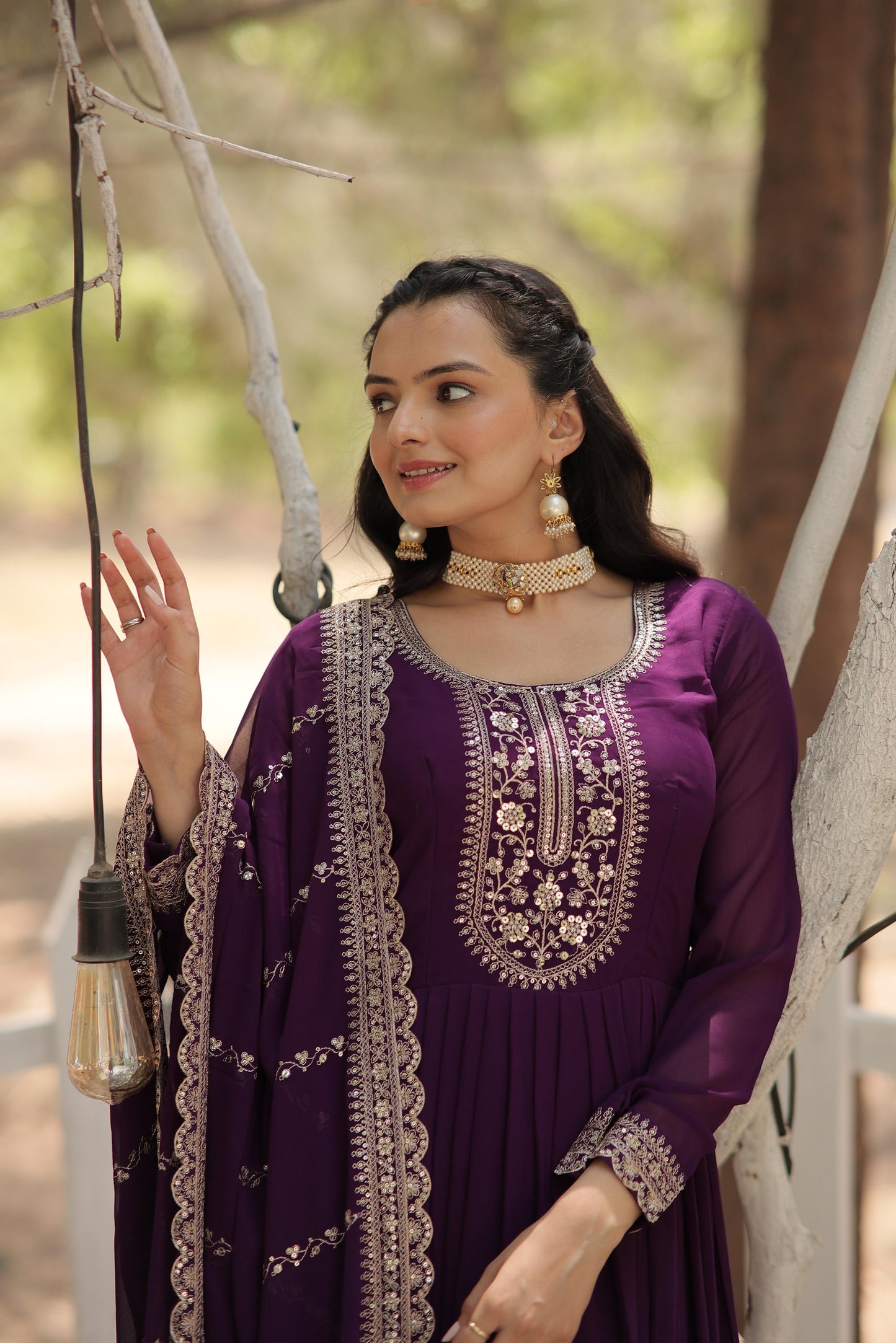 Ravishing Embroidered Work Black & Purple Color Gown