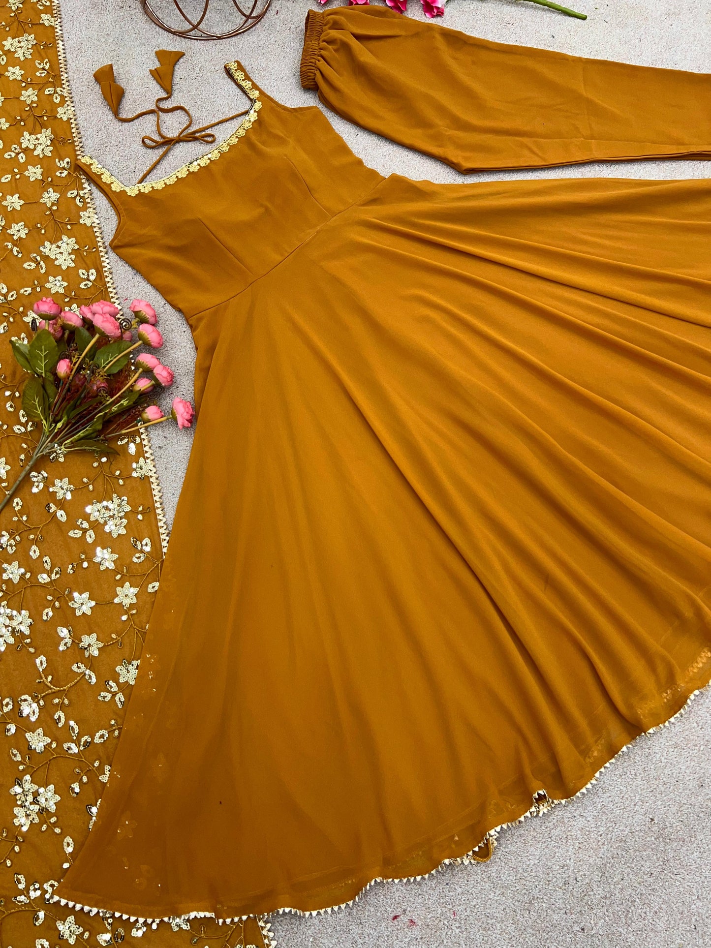 Presenting Yellow Color Plain Georgette Gown