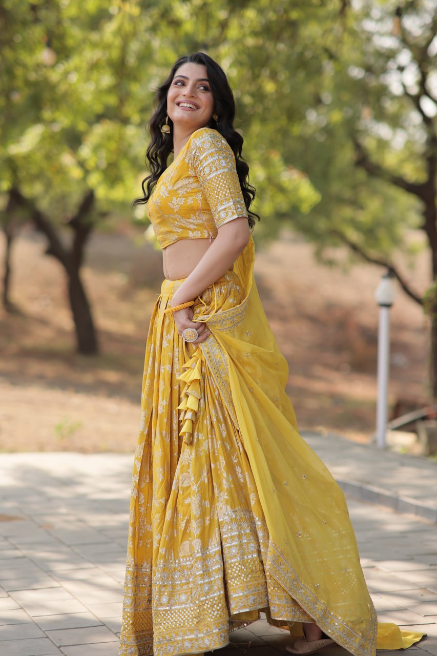 Weeding Wear Yellow And Maroon Color Jacquard Sequence Work Lehenga Choli