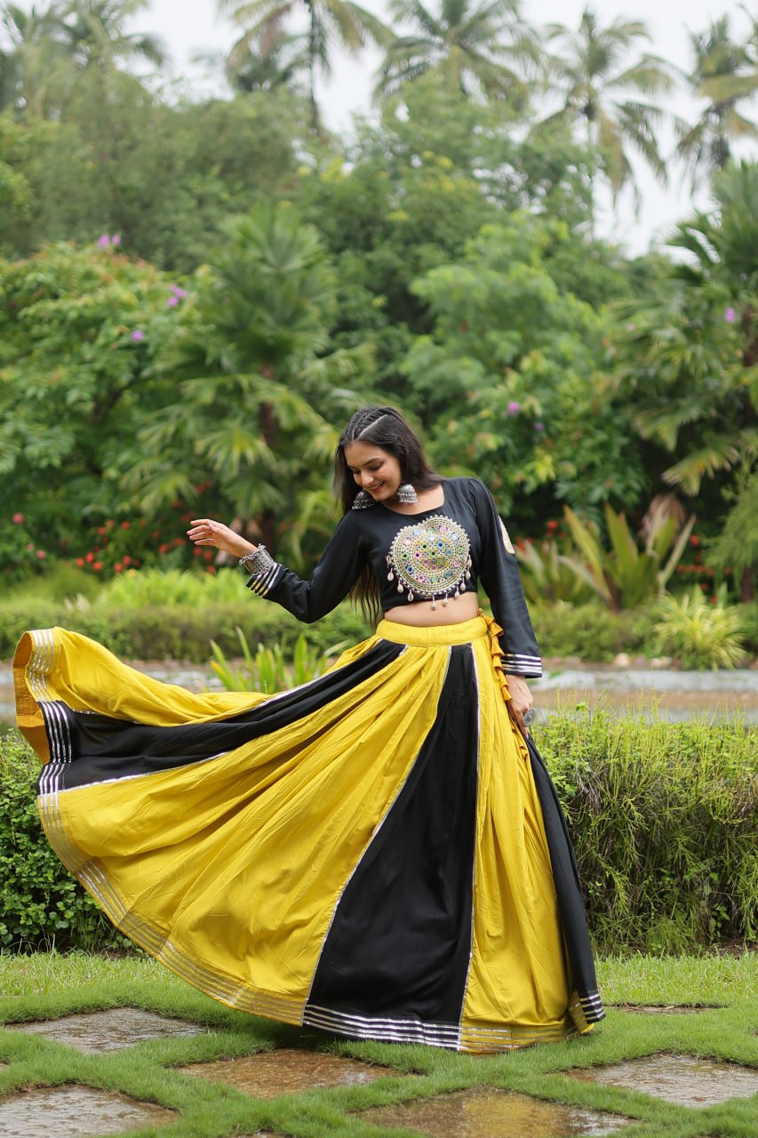 Navratri Reyon Gota-Patti Work Yellow Black Color Lehenga Choli