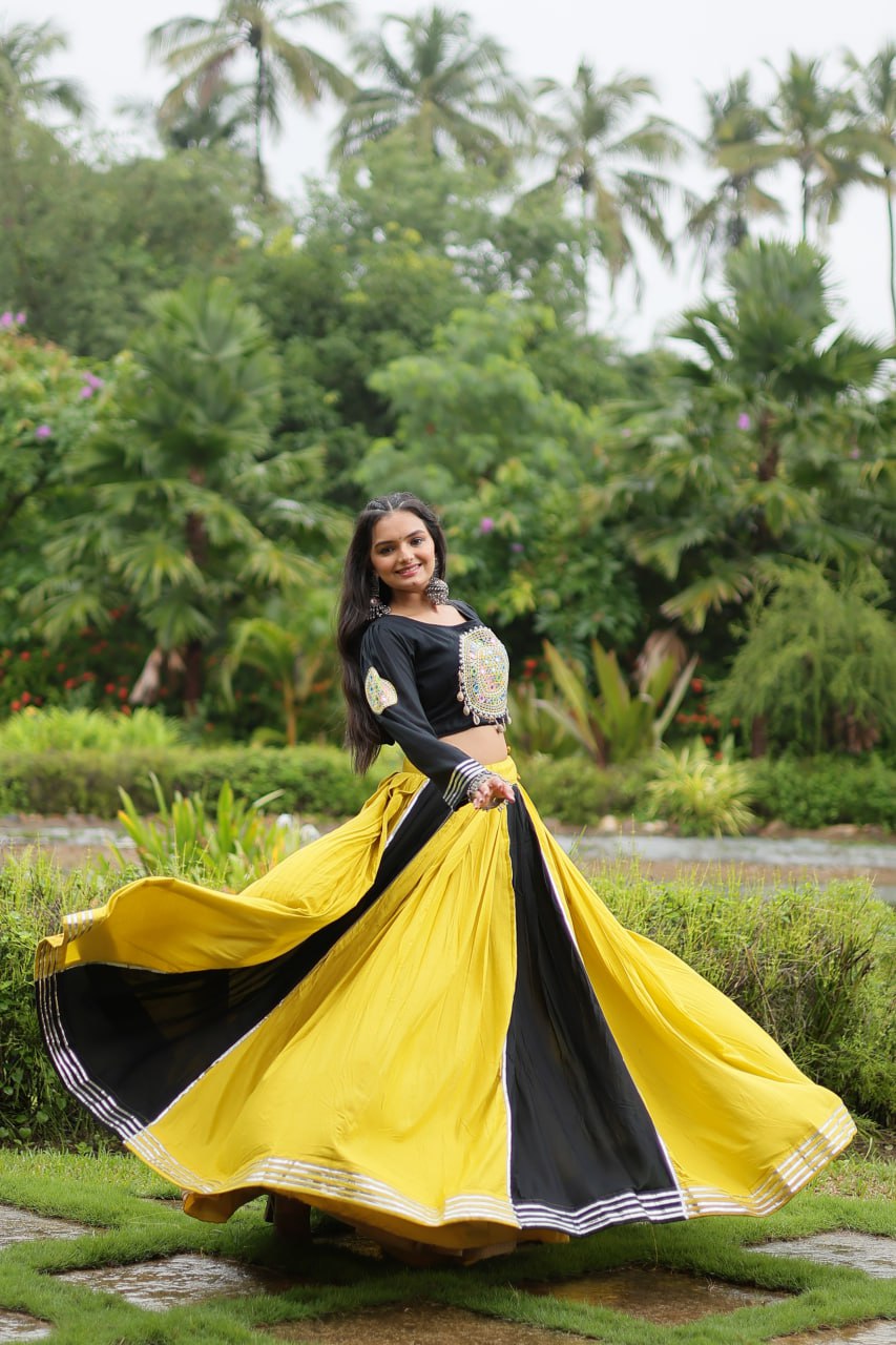Navratri Reyon Gota-Patti Work Yellow Black Color Lehenga Choli