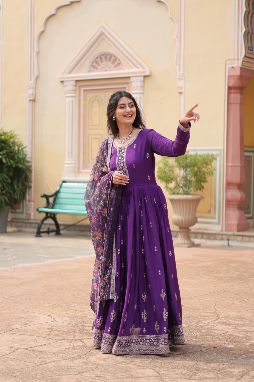 Fabulous Purple And Wine Color Embroidered Work Kalamkari Border Gown