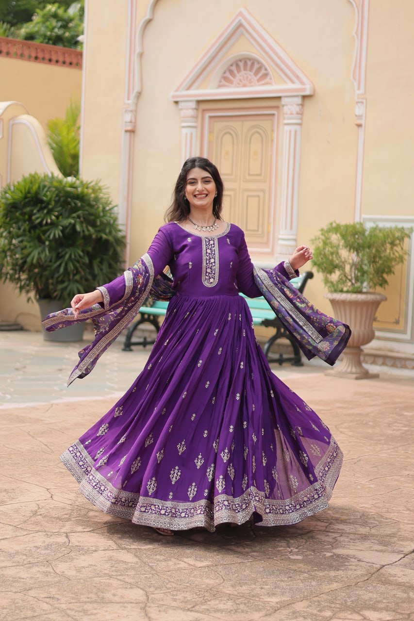 Fabulous Purple And Wine Color Embroidered Work Kalamkari Border Gown