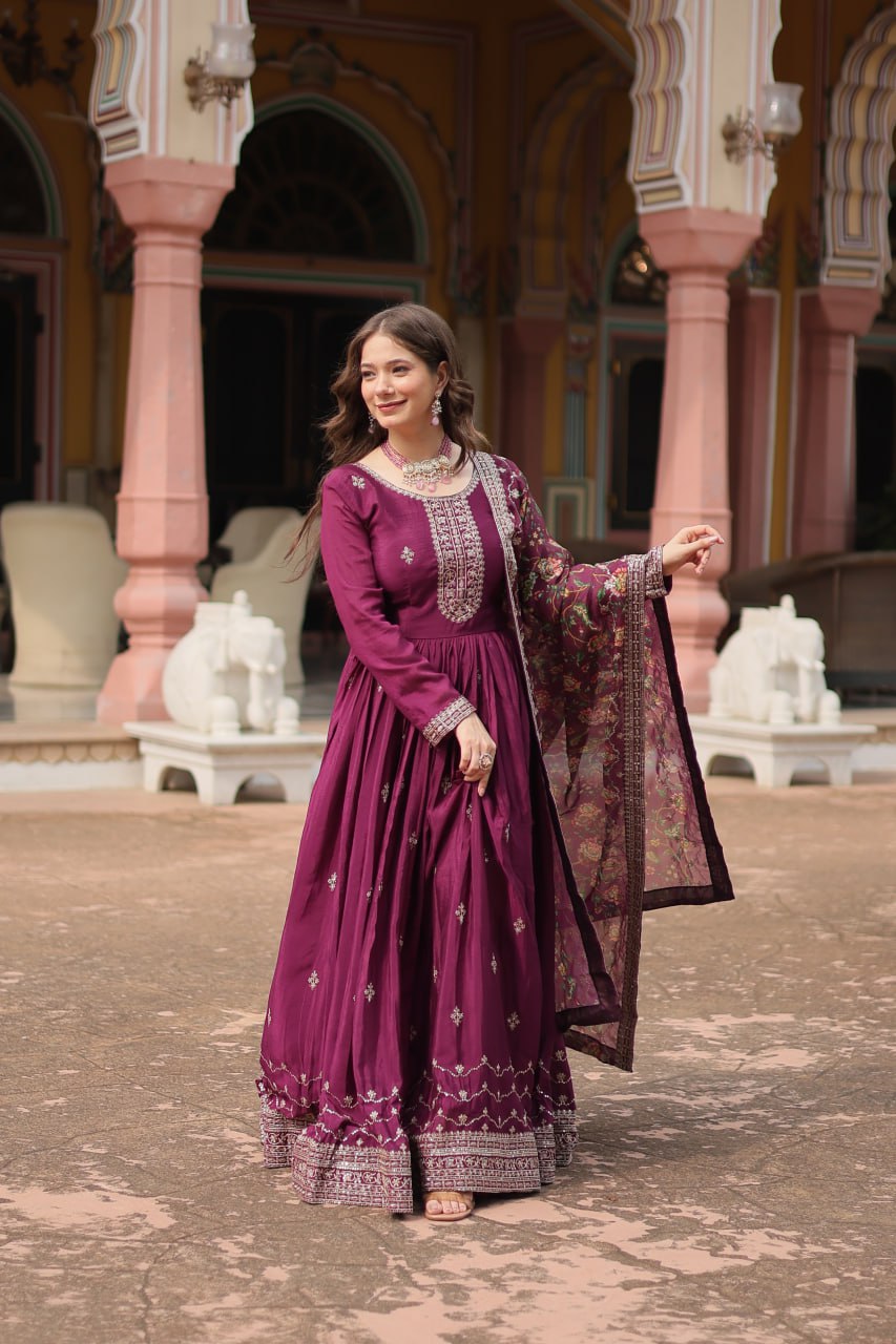 Fabulous Purple And Wine Color Embroidered Work Kalamkari Border Gown