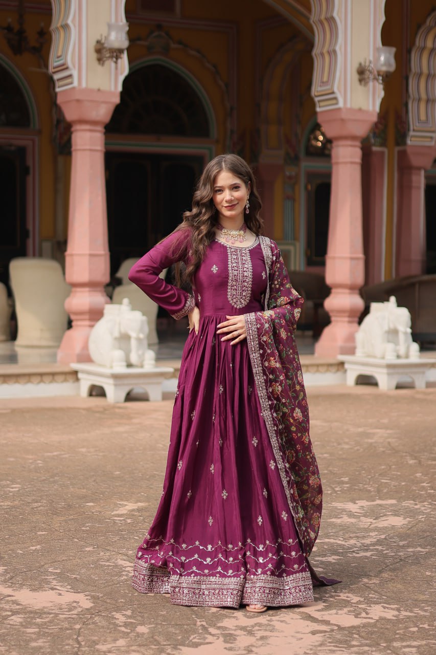 Fabulous Purple And Wine Color Embroidered Work Kalamkari Border Gown