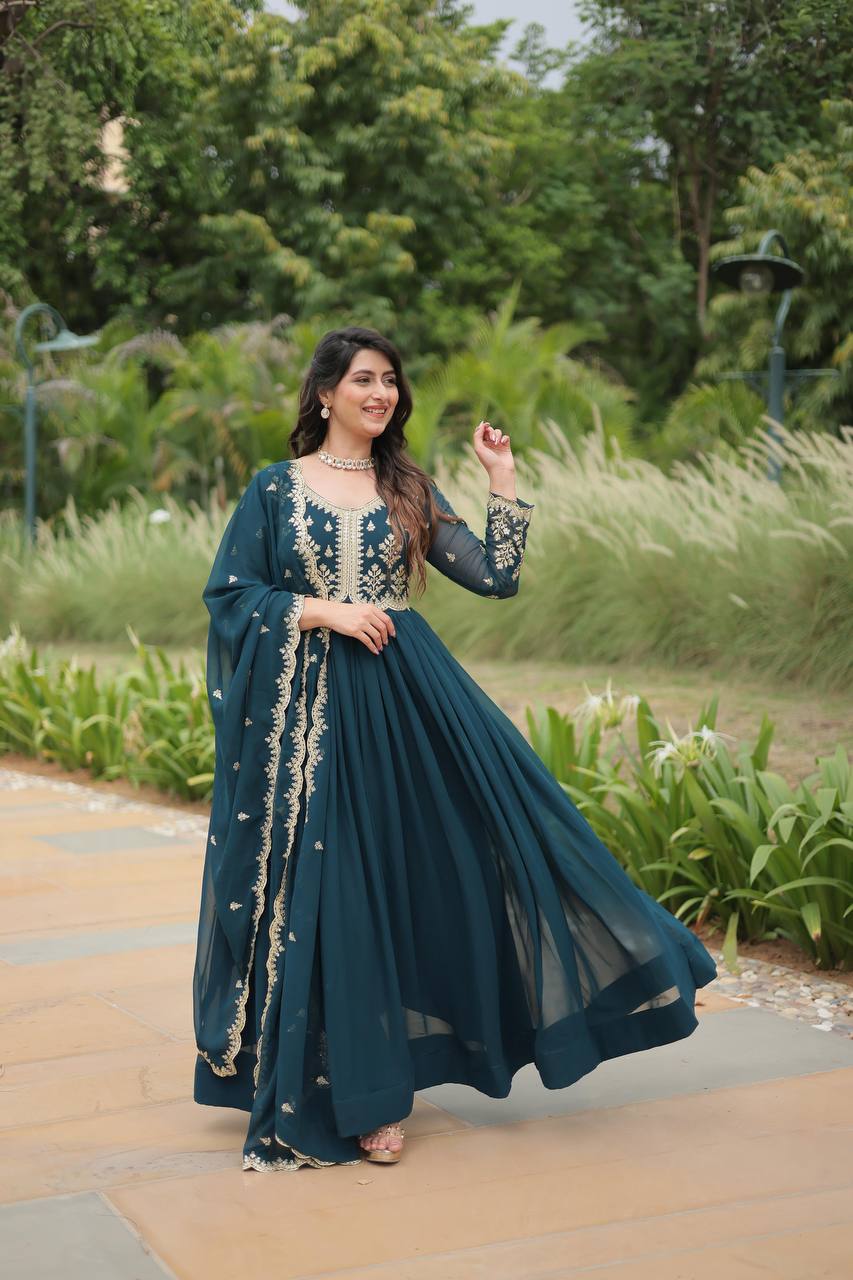 Graceful Aqua Blue Color Embroidered Work Kalamkari Border Gown