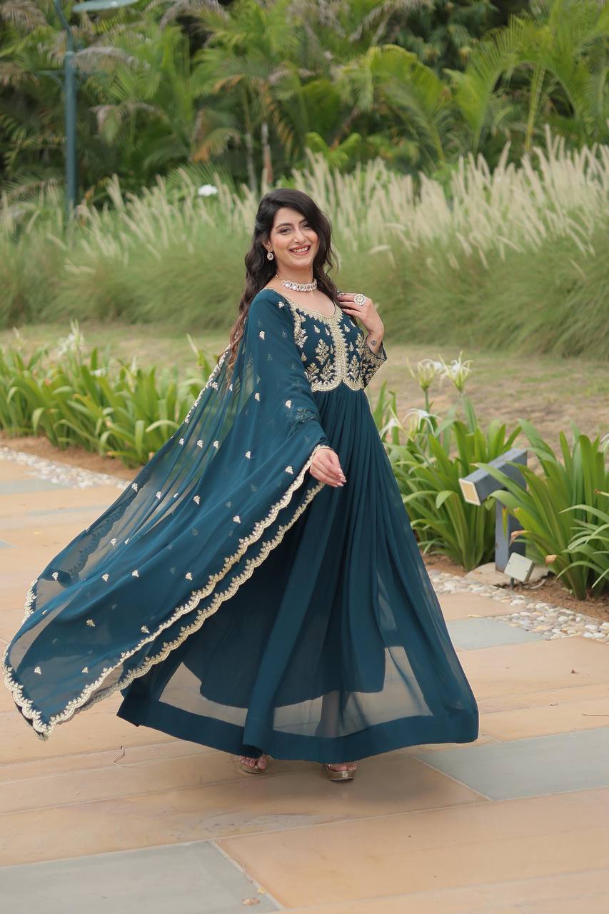 Graceful Aqua Blue Color Embroidered Work Kalamkari Border Gown