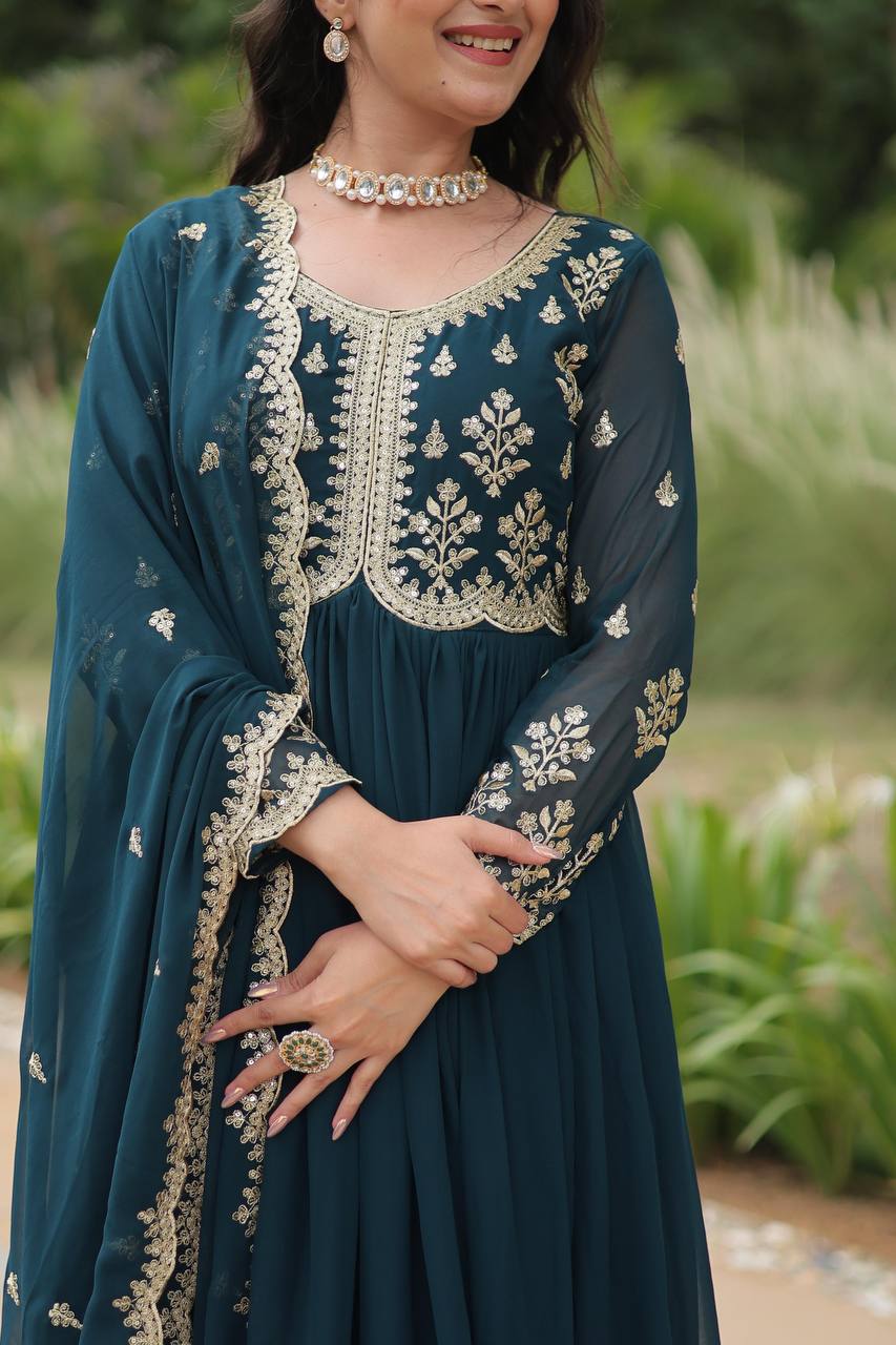 Graceful Aqua Blue Color Embroidered Work Kalamkari Border Gown