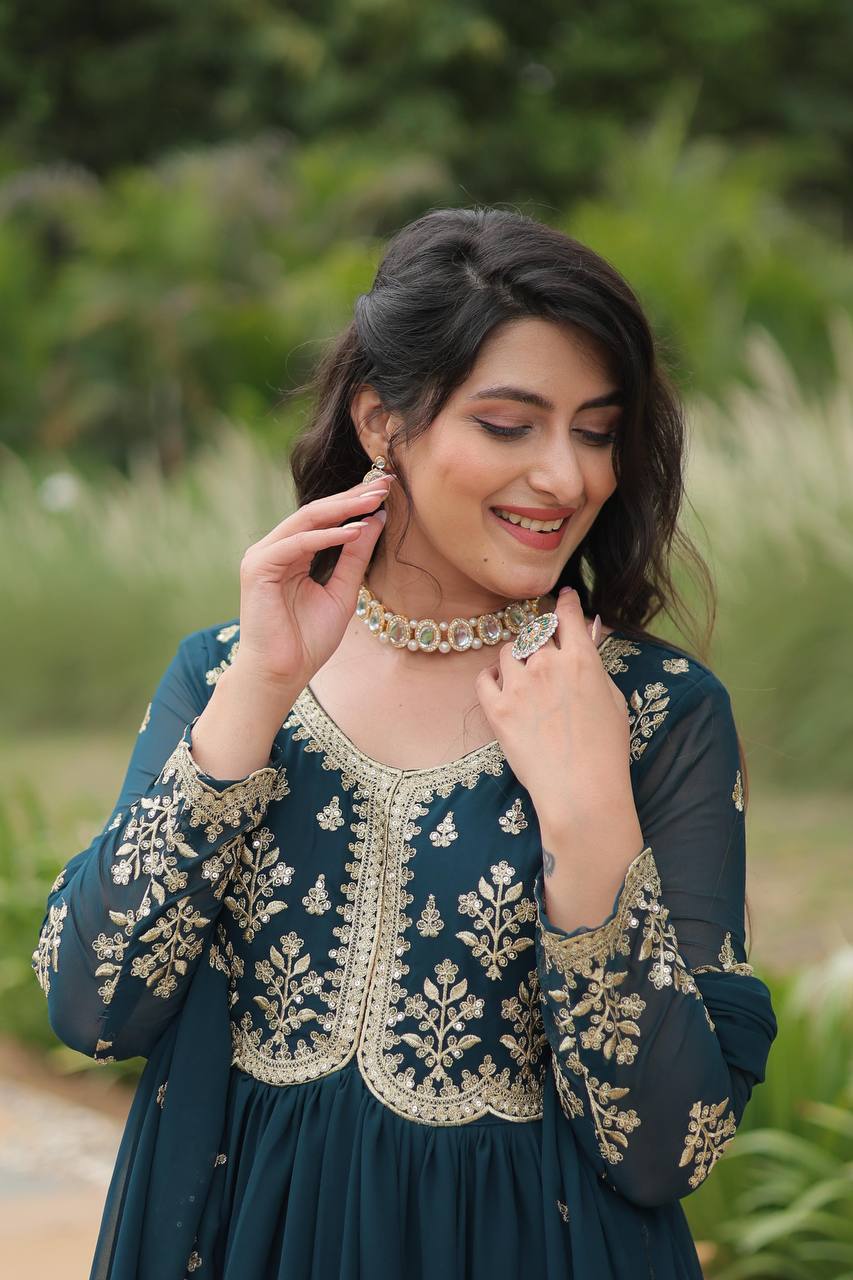 Graceful Aqua Blue Color Embroidered Work Kalamkari Border Gown