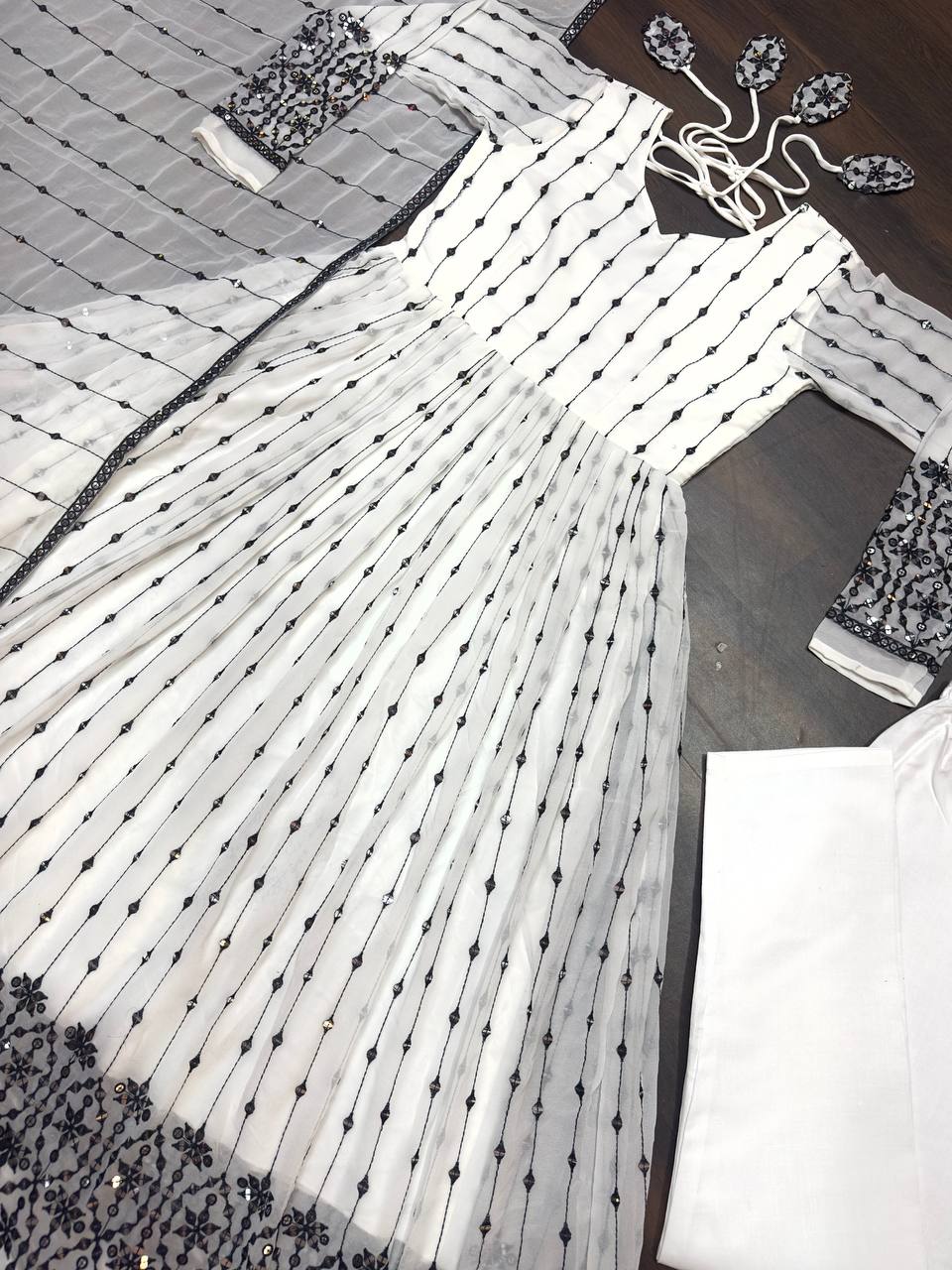 Gorgeous Black Embroidery Work With White Gown