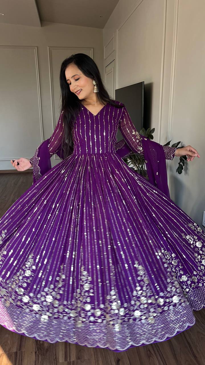 Delightful Embroidery Work Purple & Pink Color Gown