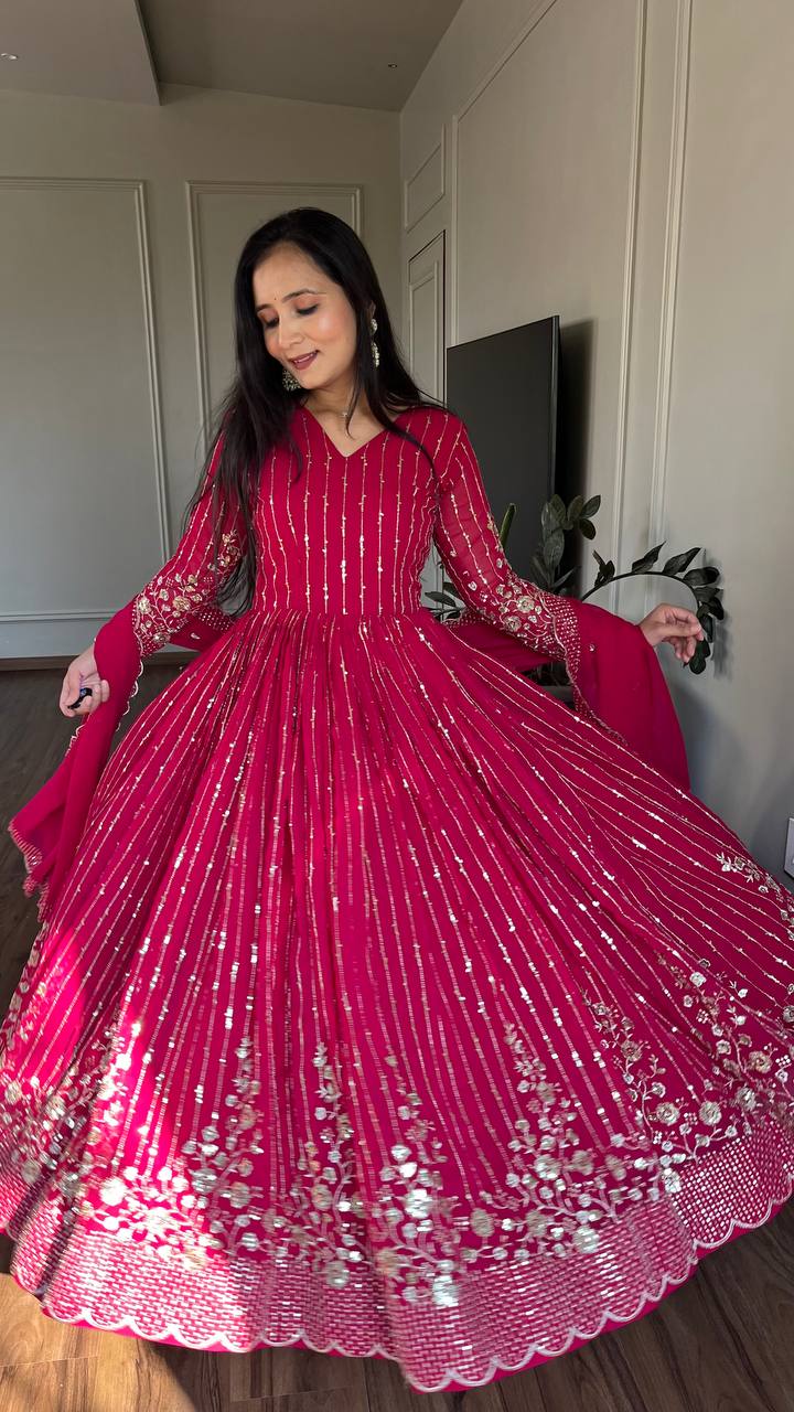 Delightful Embroidery Work Purple & Pink Color Gown