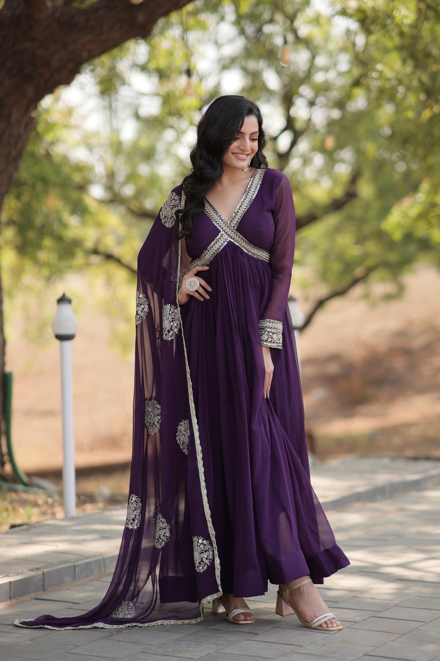 Classic Embroidery Work Maroon And Purple Color Gown
