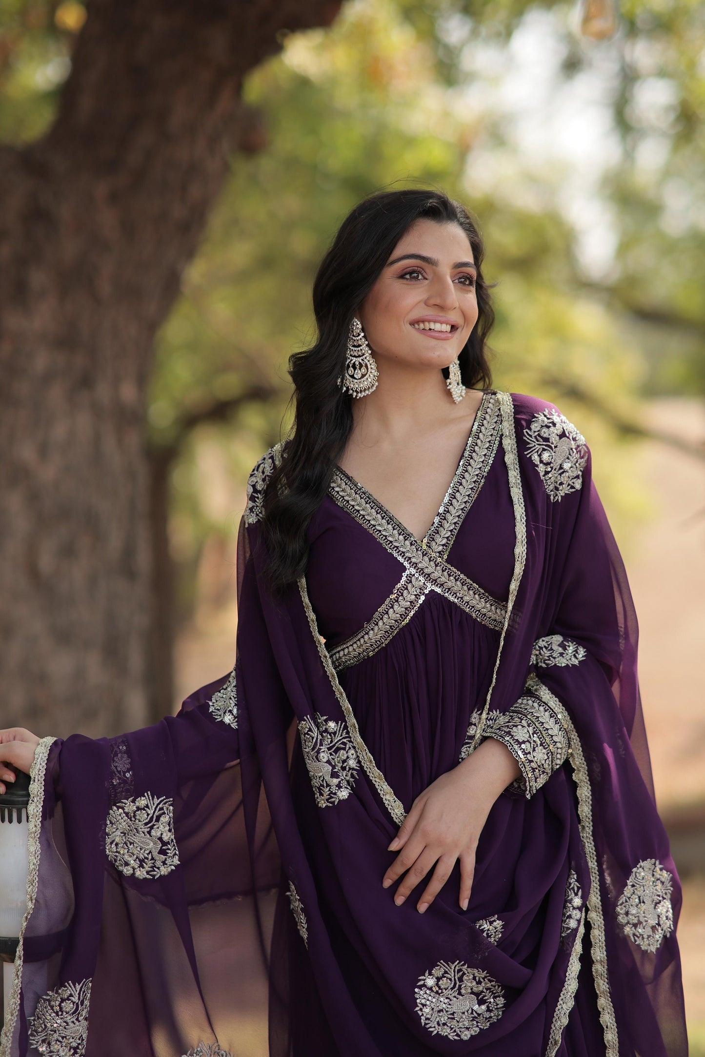Classic Embroidery Work Maroon And Purple Color Gown
