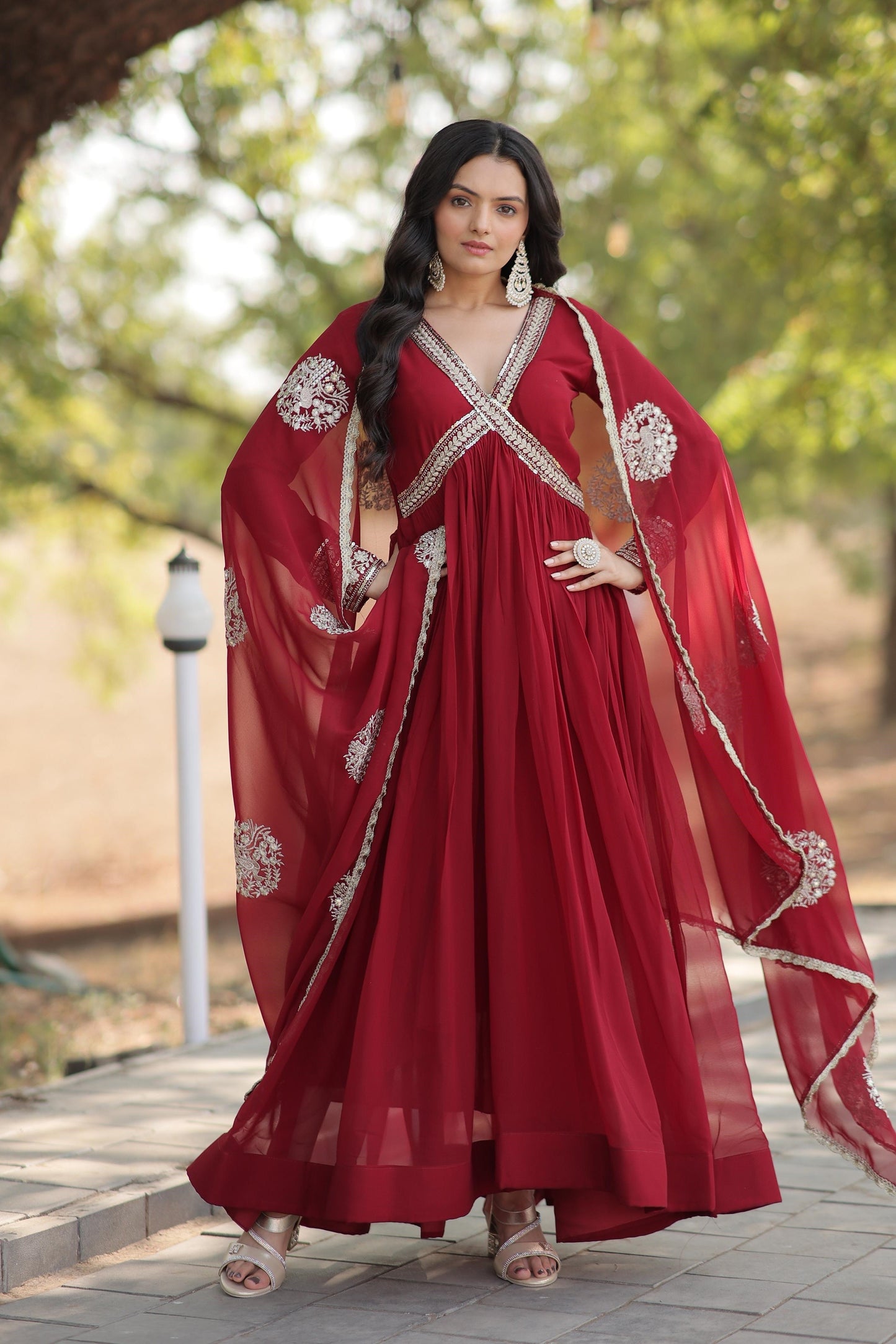 Classic Embroidery Work Maroon And Purple Color Gown