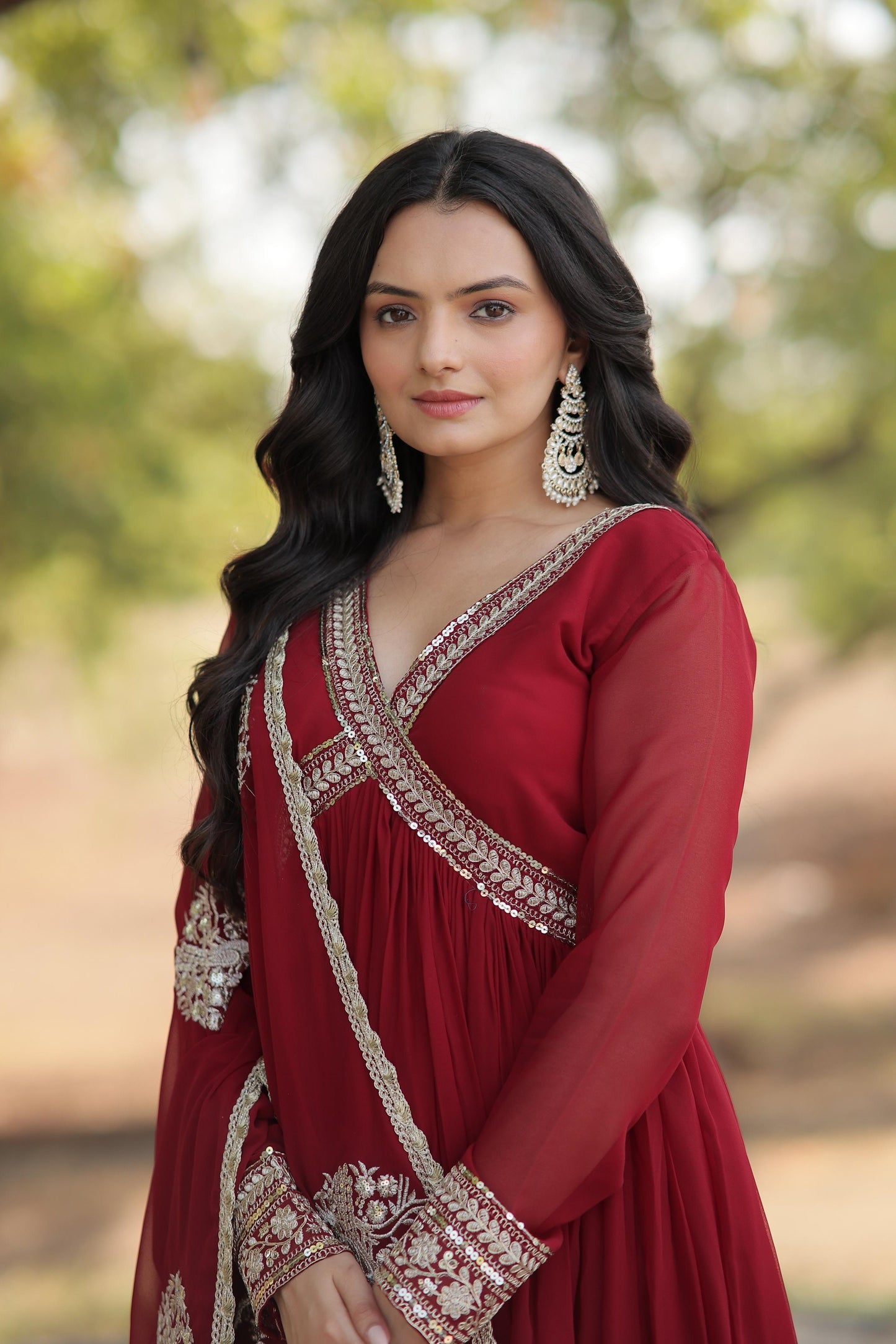 Classic Embroidery Work Maroon And Purple Color Gown