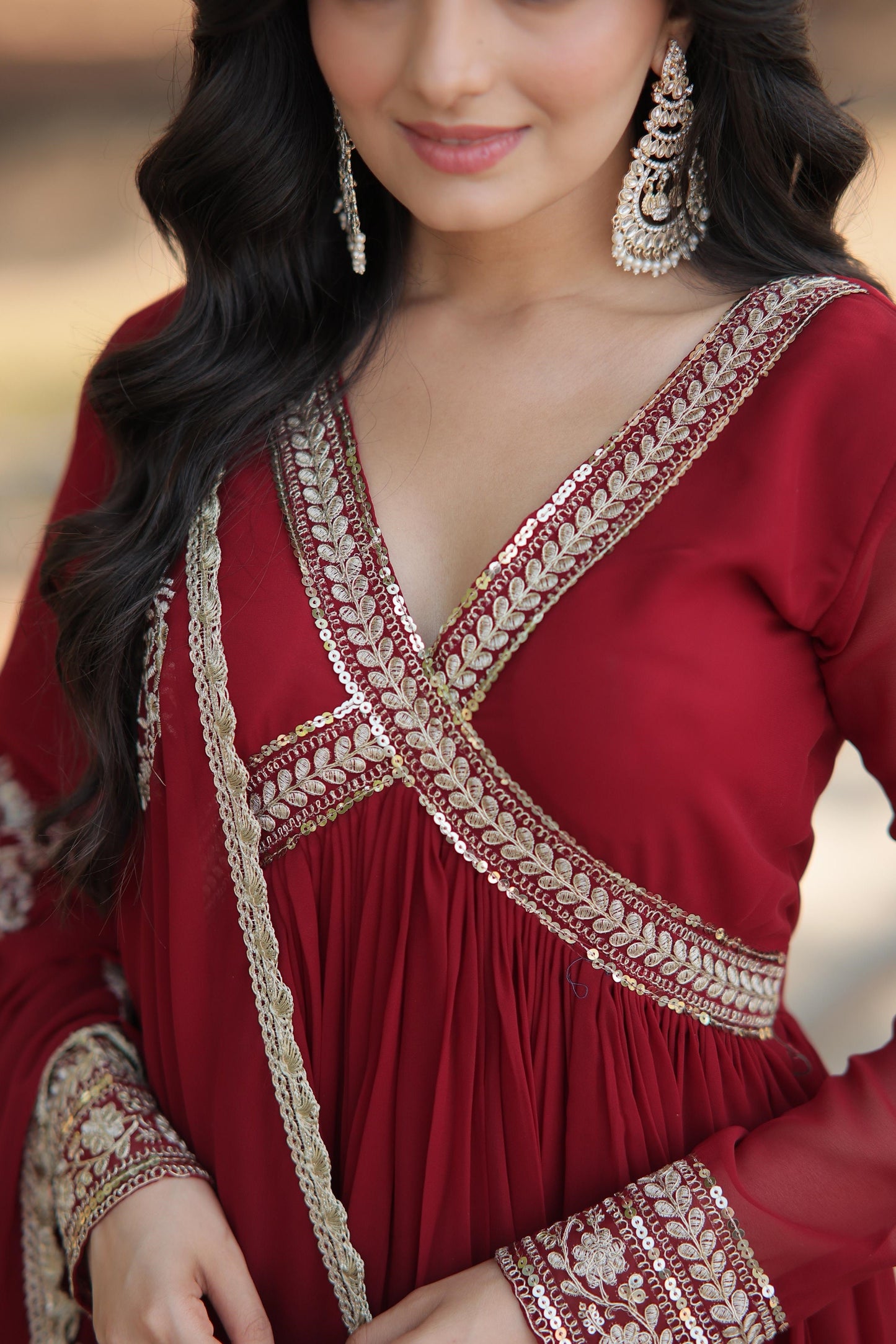 Classic Embroidery Work Maroon And Purple Color Gown