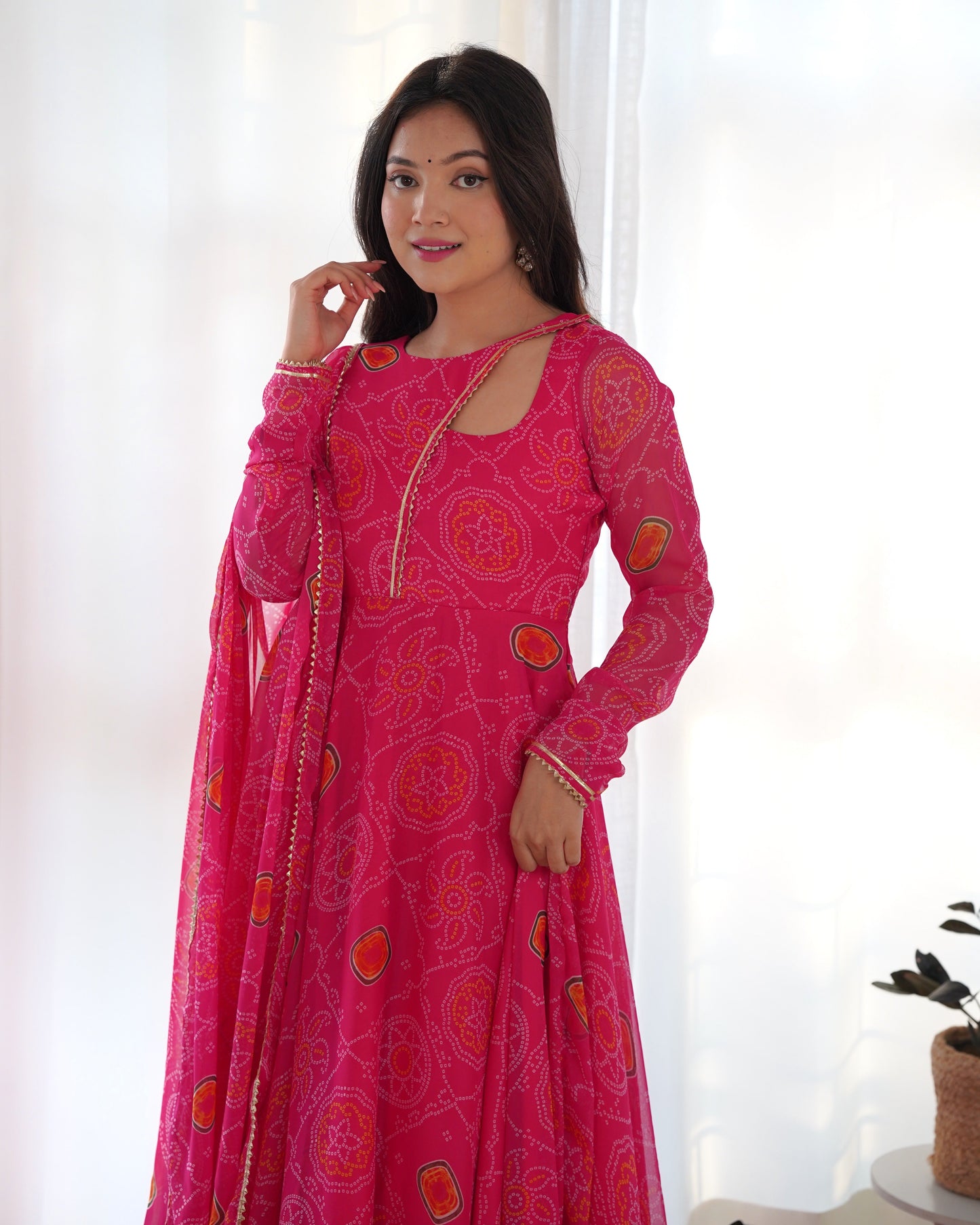 Ravishing Chiffon Bandhej Pink Color Gown With Dupatta
