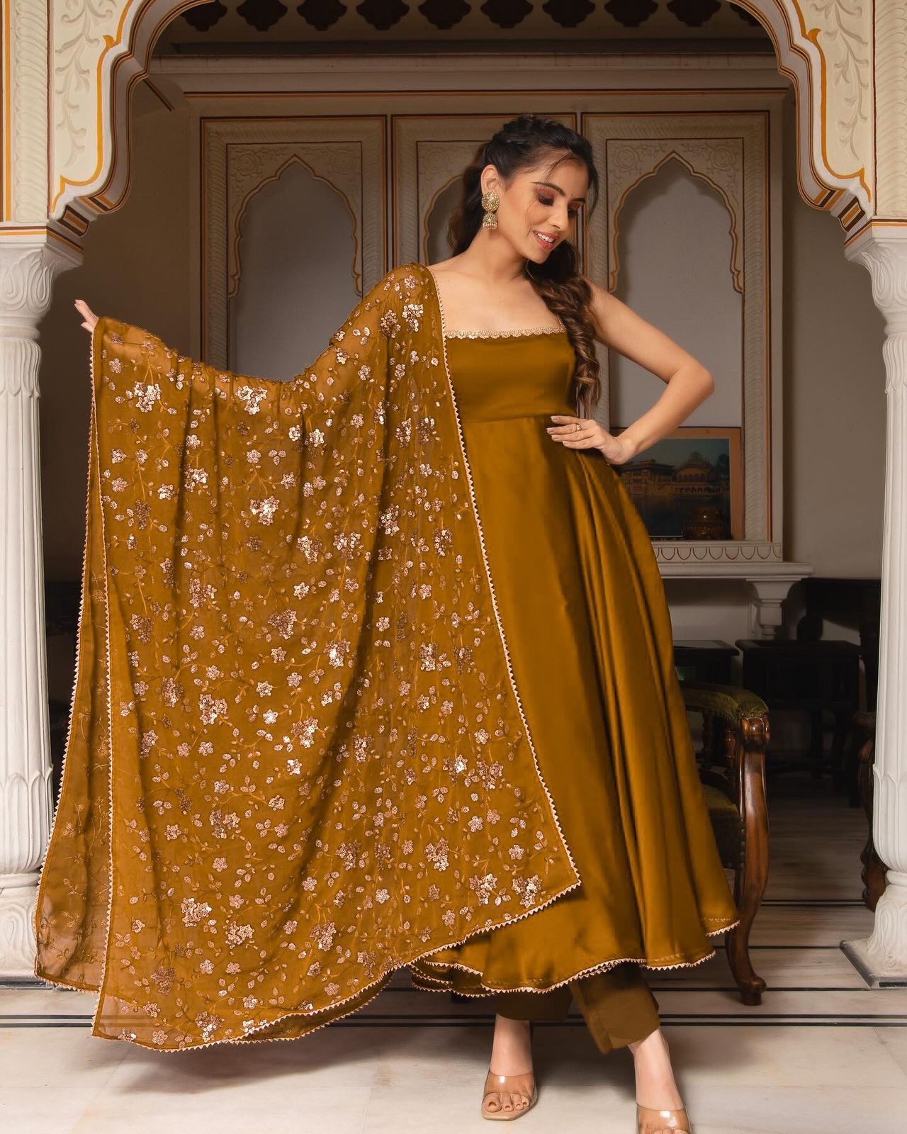 Presenting Yellow Color Plain Georgette Gown