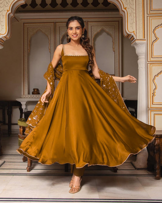 Presenting Yellow Color Plain Georgette Gown