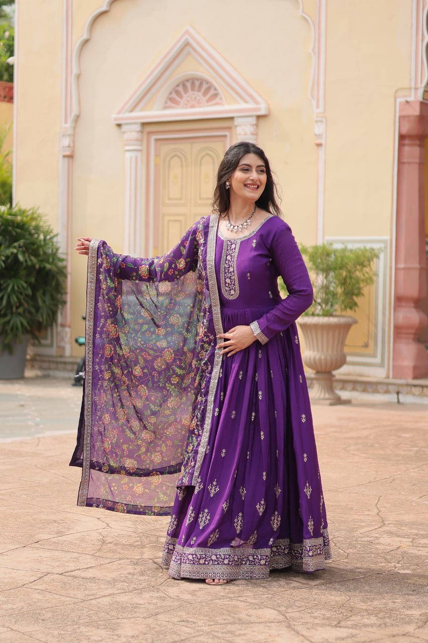Fabulous Purple And Wine Color Embroidered Work Kalamkari Border Gown