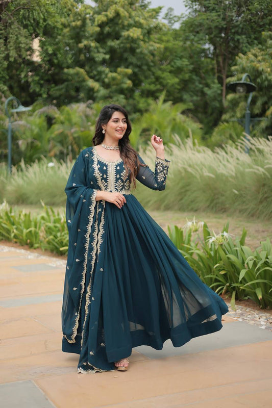 Graceful Aqua Blue Color Embroidered Work Kalamkari Border Gown