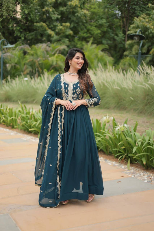Graceful Aqua Blue Color Embroidered Work Kalamkari Border Gown