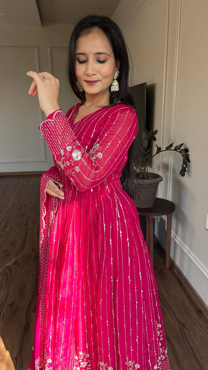 Delightful Embroidery Work Purple & Pink Color Gown