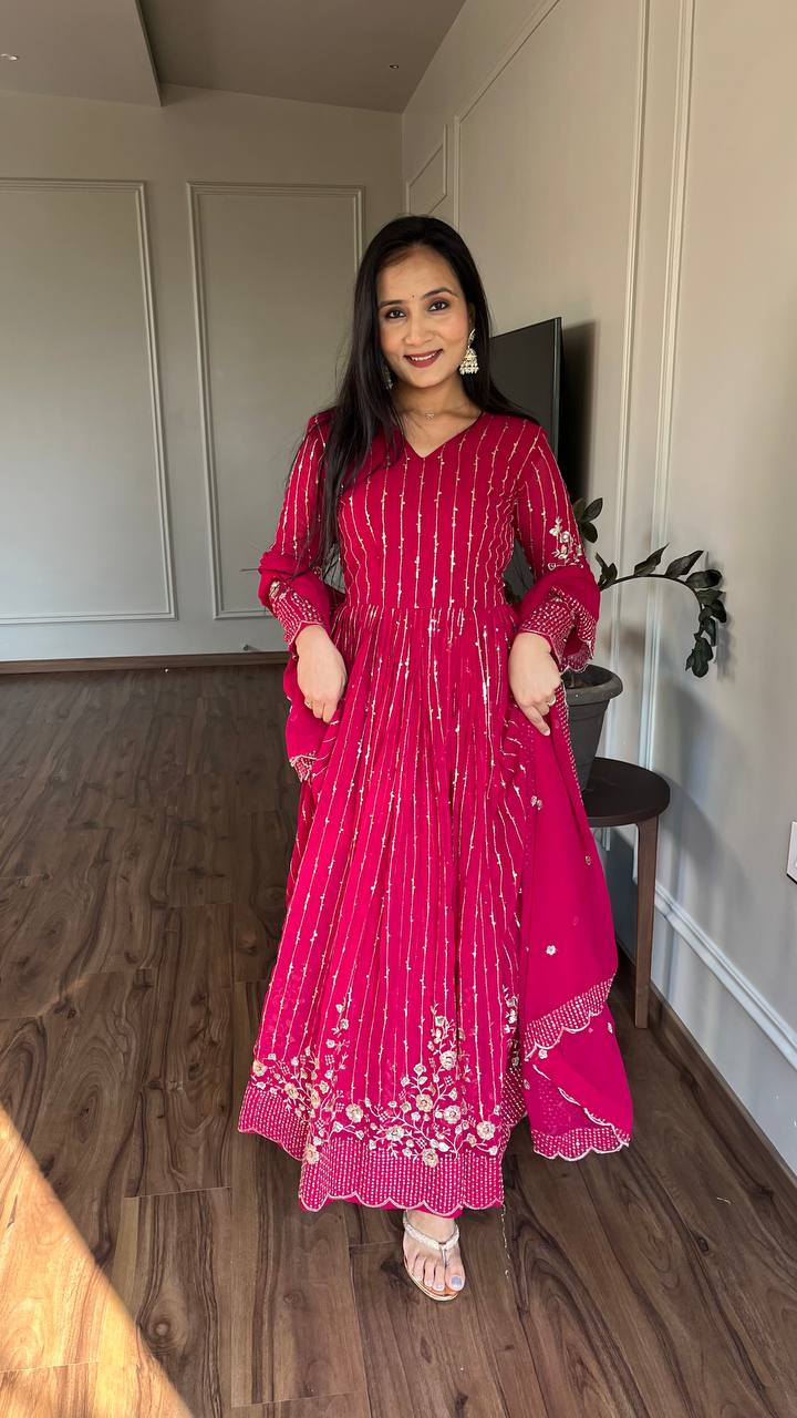Delightful Embroidery Work Purple & Pink Color Gown